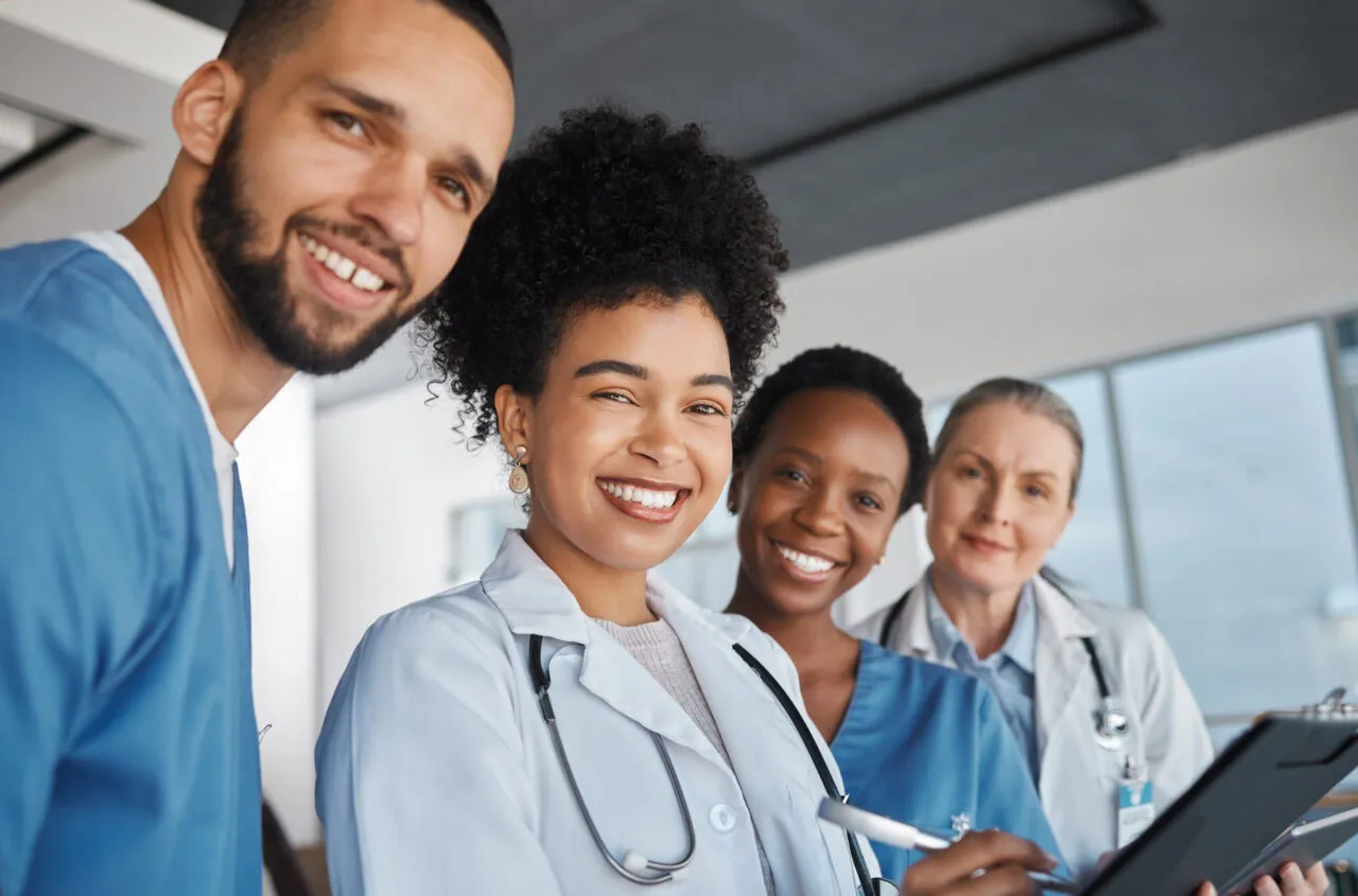 Medicine, doctors and healthcare team at work with smile for medical portrait, diversity and teamwork in Canada hospital. Trust, collaboration or cardiology with nurse, worker or clinic employees